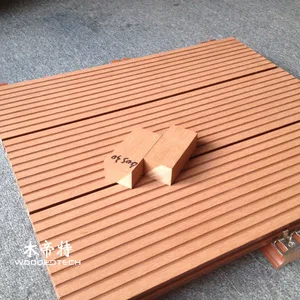 composite deck over concrete patio creates an attractive outdoor living area with easy installation