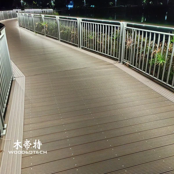 Swimming pool wood plastic flooring provides a safe and stylish surface for outdoor areas