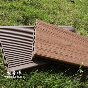 GD14023 capped wpc decking with semi wrapped design round holes and excellent surface texture creates attractive lighting effects at night